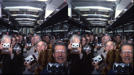 Image of bus full of 3-D people each holding 3-D camera 1983 by Susan Pinsky